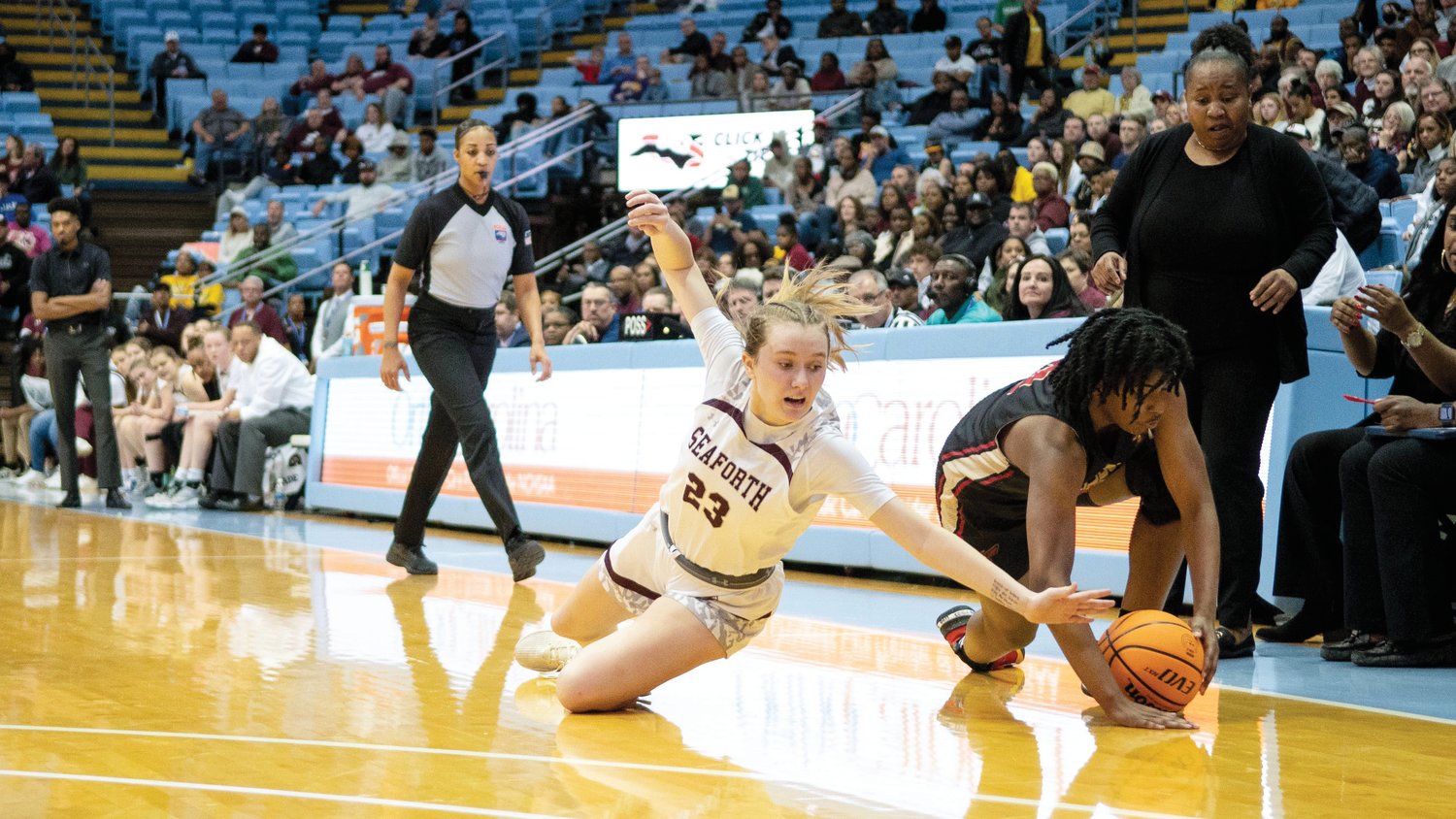 Seaforth sophomore Peyton Collins (23) dives for a loose ball in the Hawks' 48-39 loss to Salisbury in the 2A girls state final Saturday.